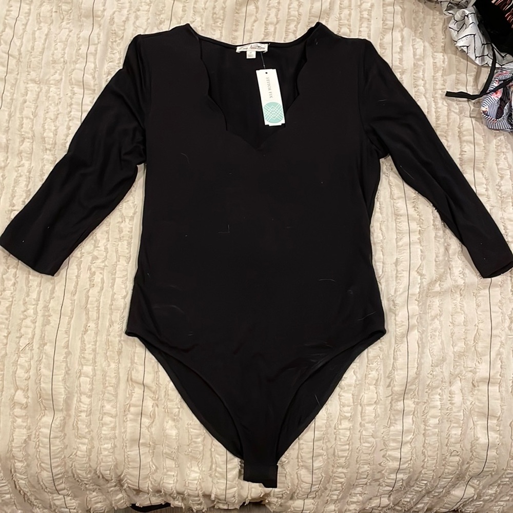 Nine Britton black bodysuit